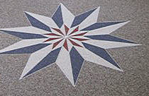 Sternförmiges Ornament im Boden
